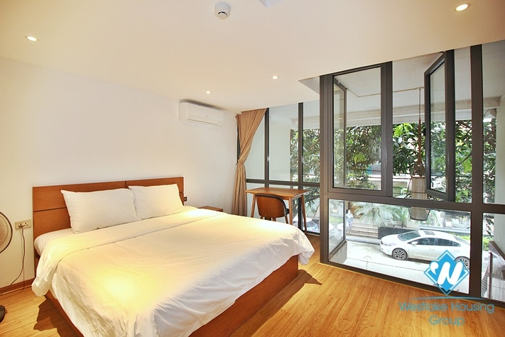 An elegant duplex 1 bedroom apartment  for rent on Xuan Dieu street