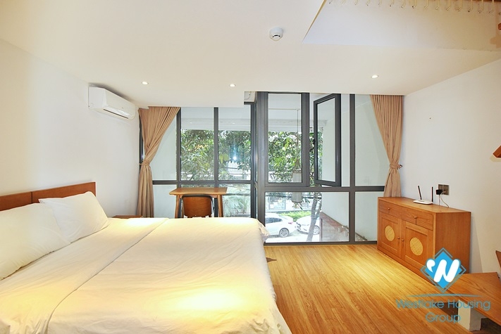 An elegant duplex 1 bedroom apartment  for rent on Xuan Dieu street