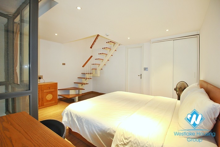 An elegant duplex 1 bedroom apartment  for rent on Xuan Dieu street