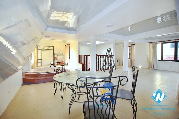 Charming house with nice design and big yard for rent in To Ngoc Van, Tay Ho, Ha Noi
