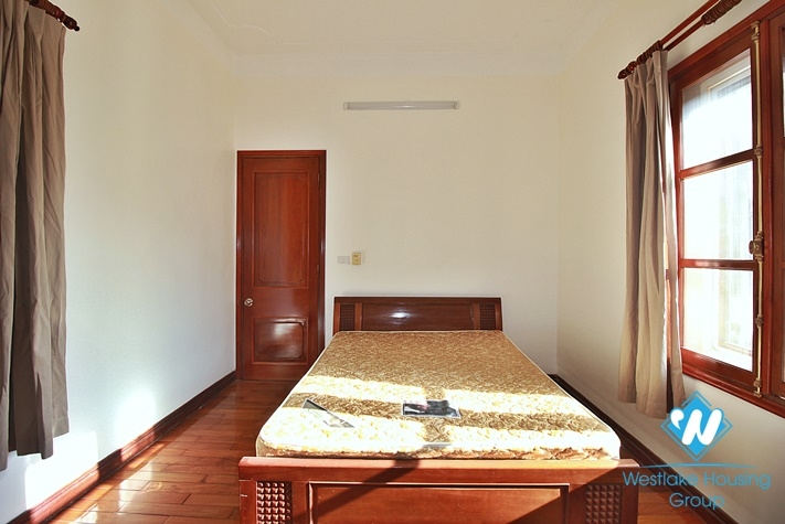 Charming house with nice design and big yard for rent in To Ngoc Van, Tay Ho, Ha Noi