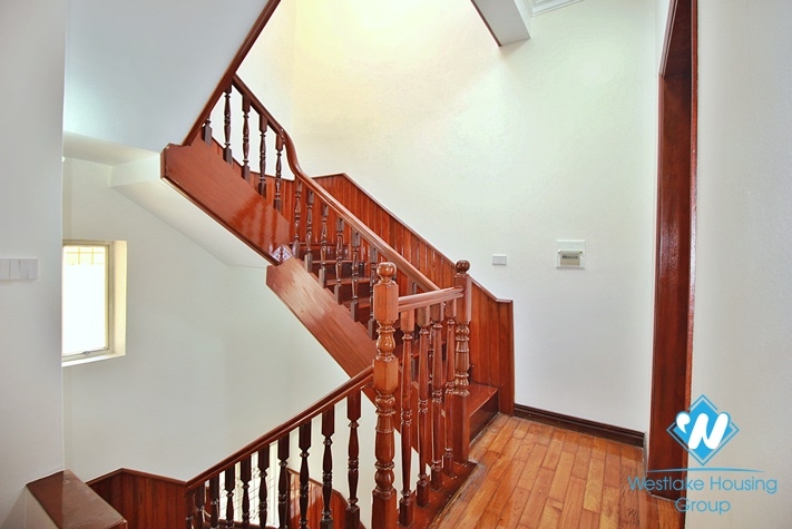 Charming house with nice design and big yard for rent in To Ngoc Van, Tay Ho, Ha Noi