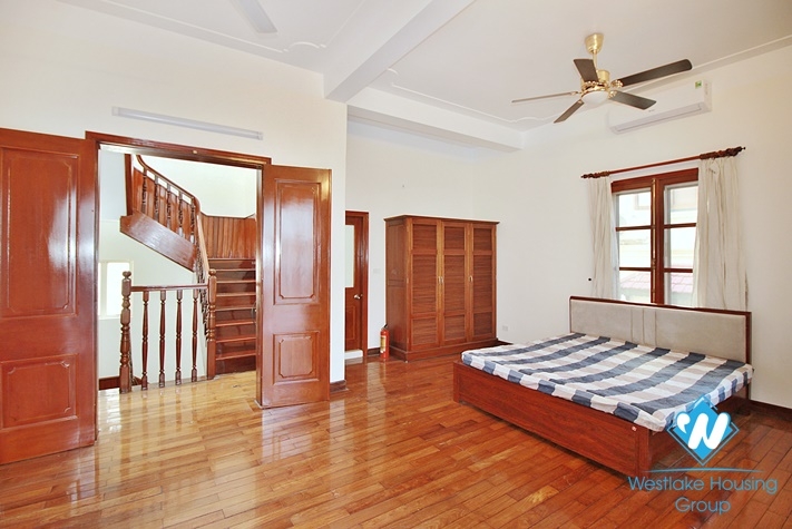 Charming house with nice design and big yard for rent in To Ngoc Van, Tay Ho, Ha Noi