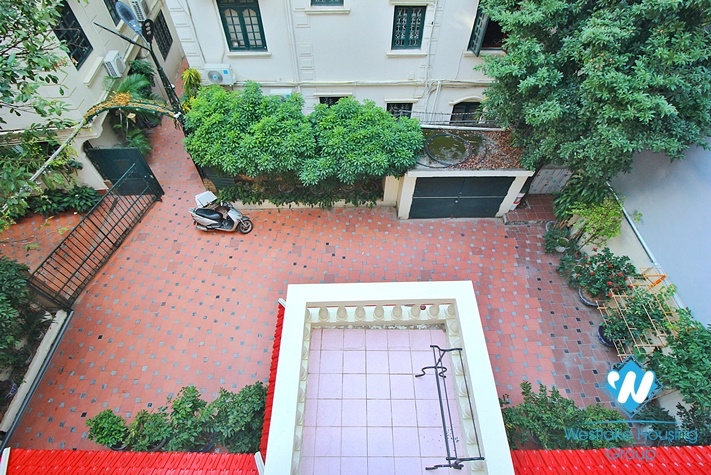 Charming house with nice design and big yard for rent in To Ngoc Van, Tay Ho, Ha Noi