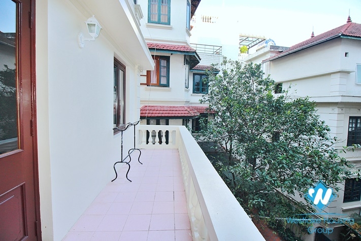 Charming house with nice design and big yard for rent in To Ngoc Van, Tay Ho, Ha Noi