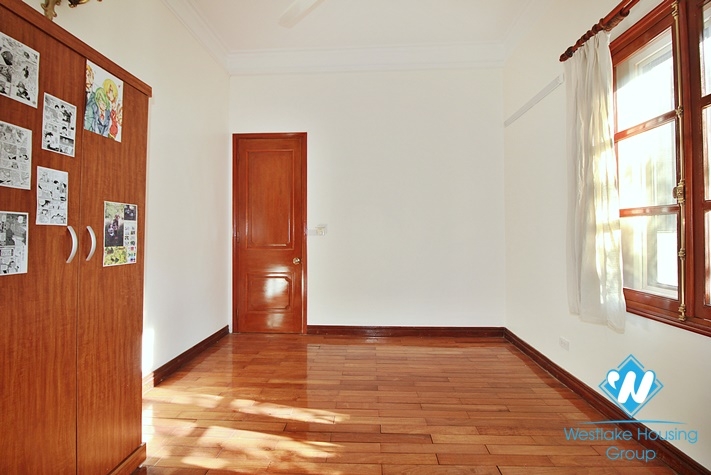 Charming house with nice design and big yard for rent in To Ngoc Van, Tay Ho, Ha Noi