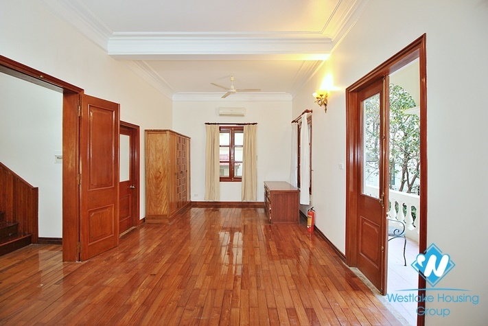 Charming house with nice design and big yard for rent in To Ngoc Van, Tay Ho, Ha Noi