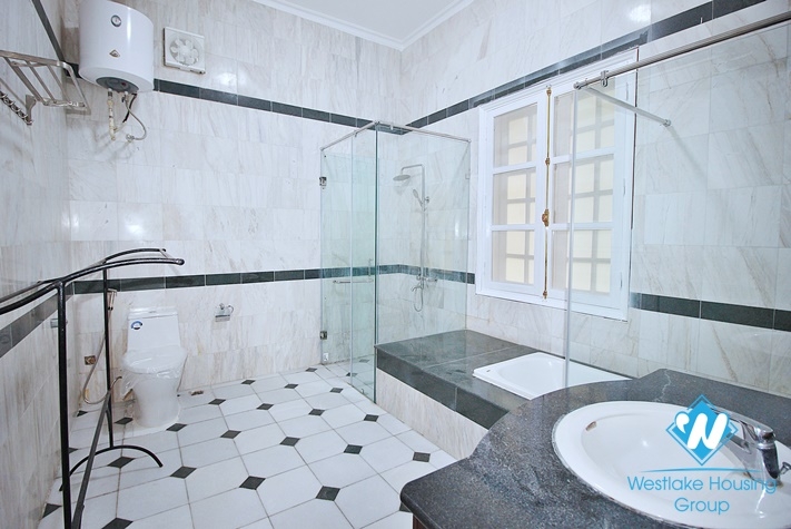 Charming house with nice design and big yard for rent in To Ngoc Van, Tay Ho, Ha Noi