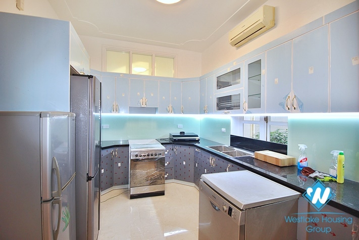 Charming house with nice design and big yard for rent in To Ngoc Van, Tay Ho, Ha Noi