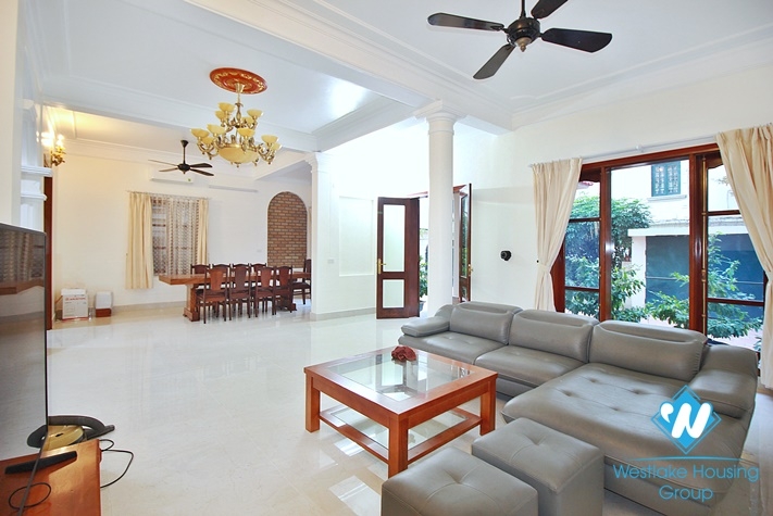 Charming house with nice design and big yard for rent in To Ngoc Van, Tay Ho, Ha Noi