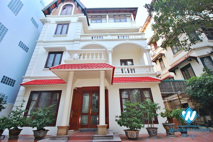 Charming house with nice design and big yard for rent in To Ngoc Van, Tay Ho, Ha Noi