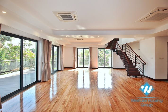 Brand new duplex 4 bedroom apartment for rent on Dang Thai Mai st, Tay  Ho district.