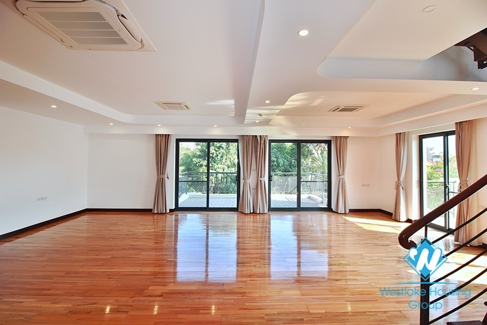 Brand new duplex 4 bedroom apartment for rent on Dang Thai Mai st, Tay  Ho district.