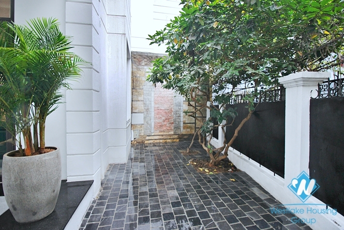 A pretty 4 bedrooms house with huge yard for rent in To Ngoc Van, Tay Ho