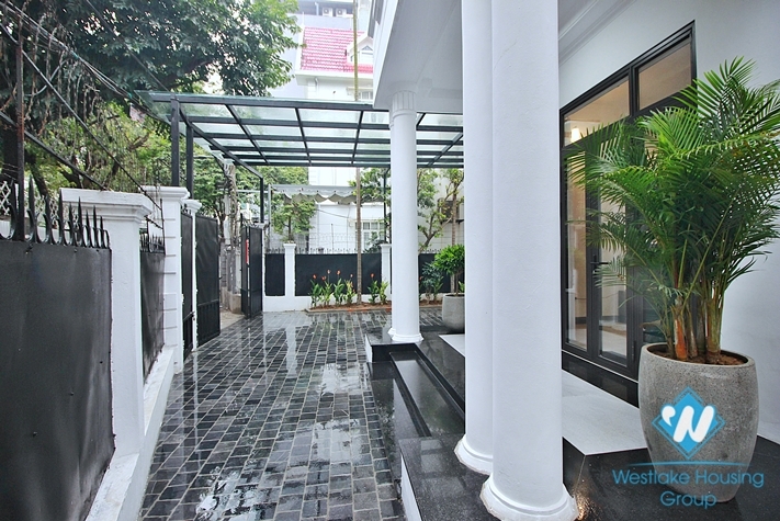 A pretty 4 bedrooms house with huge yard for rent in To Ngoc Van, Tay Ho