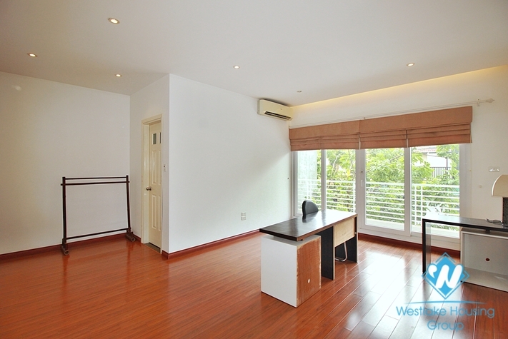 Semi-furnished 4 bedrooms house with big yard for rent in Tay Ho ward, Ha Noi
