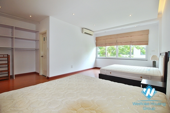 Semi-furnished 4 bedrooms house with big yard for rent in Tay Ho ward, Ha Noi