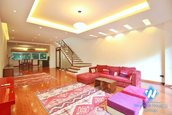 Semi-furnished 4 bedrooms house with big yard for rent in Tay Ho ward, Ha Noi