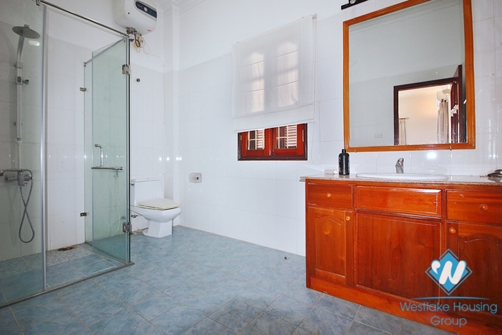 Unfurnished 4 bedrooms house with huge yard for rent in Tay Ho, Ha Noi