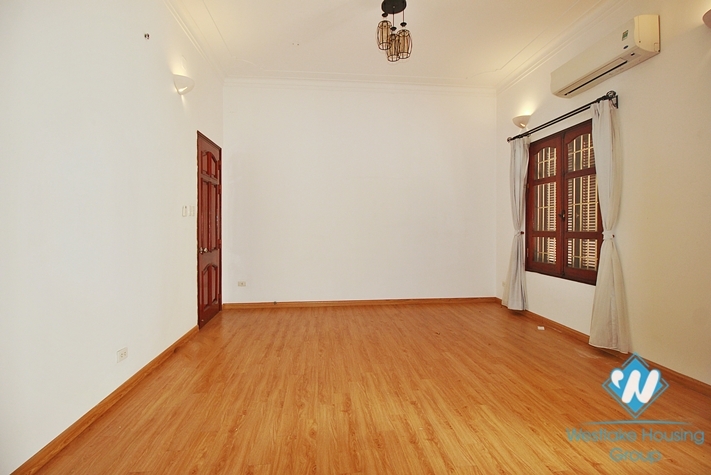 Unfurnished 4 bedrooms house with huge yard for rent in Tay Ho, Ha Noi