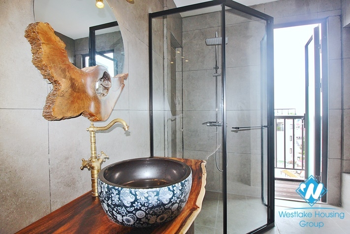 Lake view 4 bedrooms duplex apartment for rent in To Ngoc Van st, Tay Ho, Ha Noi