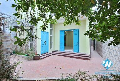 Unfurnished 3 beds house with big yard for rent in Lac Long Quan st, Tay Ho